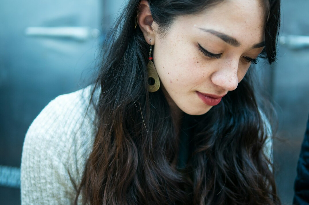 woman nodding while listening